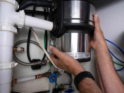 trust a plumber with garbage disposal services